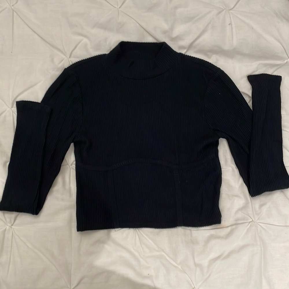 Black Pacsun long-sleeve with a mock neck, ribbed material.  Runs true to size.